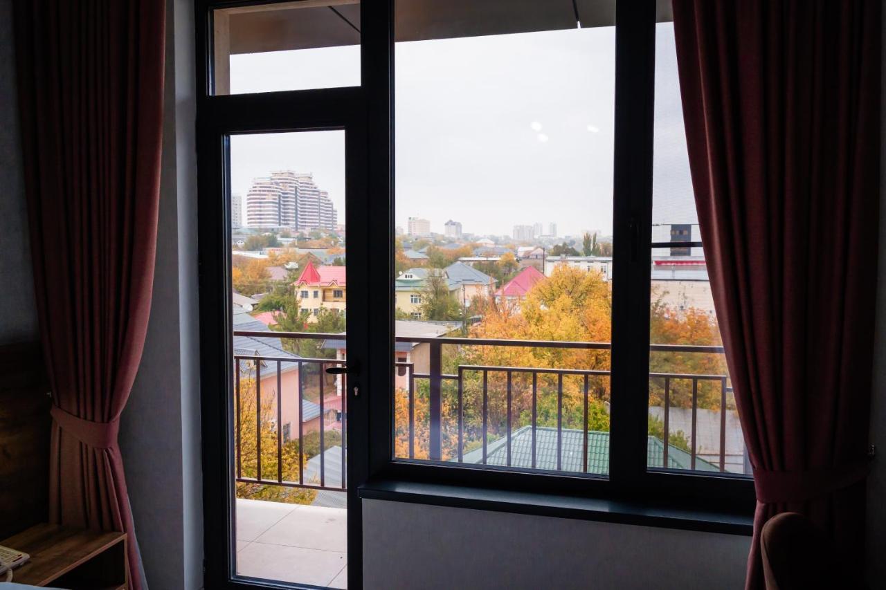 Cosmopolitan Hotel Шымкент Экстерьер фото